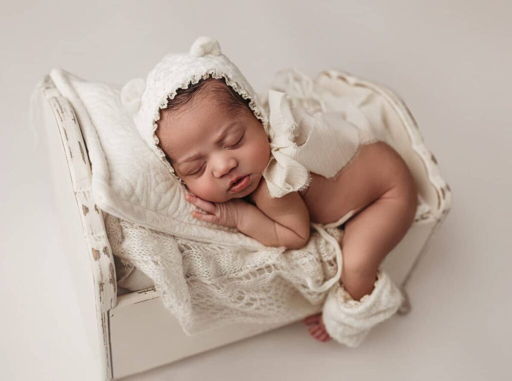 newborn baby girl posed in a prop in atlanta studio, newborn photography alpharetta ga, newborn photographer marietta, buckhead newborn photography, newborn photography set up, family photography in studio atlanta, family photographers atlanta ga, studio photography atlanta, baby photography atlanta ga