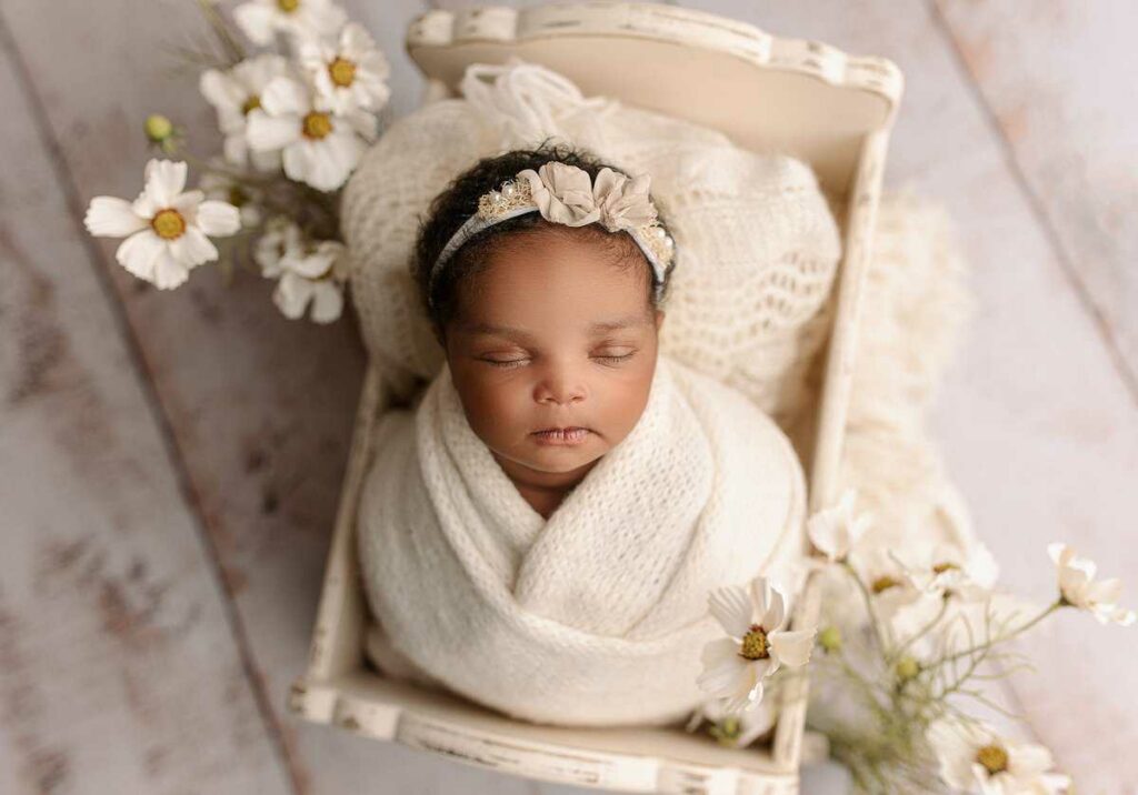 newborn photography ideas, newborn photography props, wrapping a newborn for photography, professional newborn photographer atlanta, unique newborn poses 