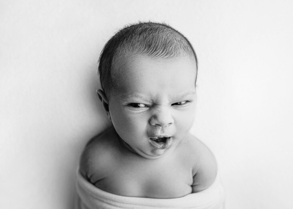 newborn photographer atlanta, newborn mug shots, awake baby girl during her newborn photography session, marietta newborn photographer, baby expressions photography