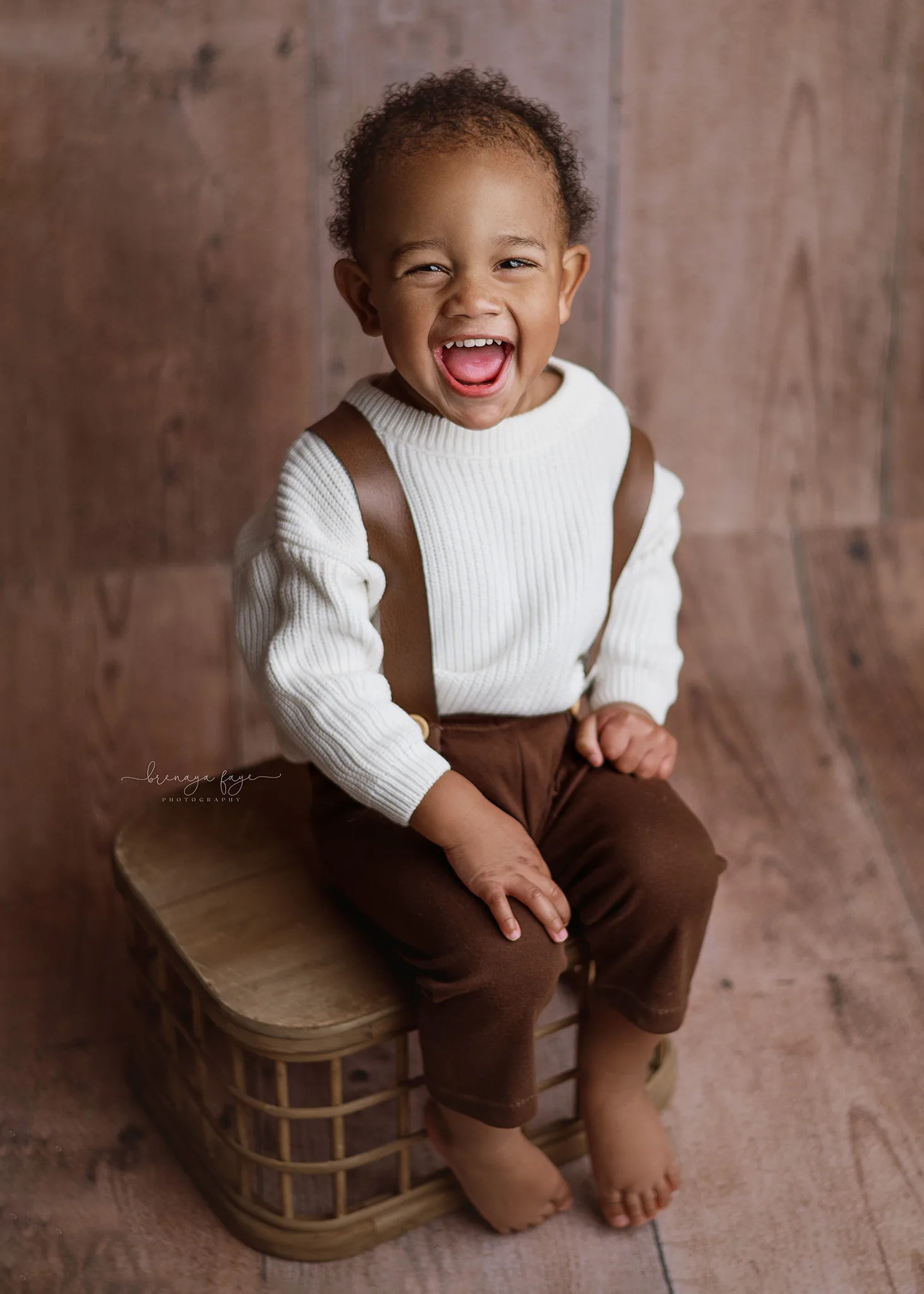 baby boy smiling during photoshoot in nebraska, lincoln nebraska, photographer with props nebraska, eagle ne baby photographer, omaha milestone photographer, cake smash photography nebraska