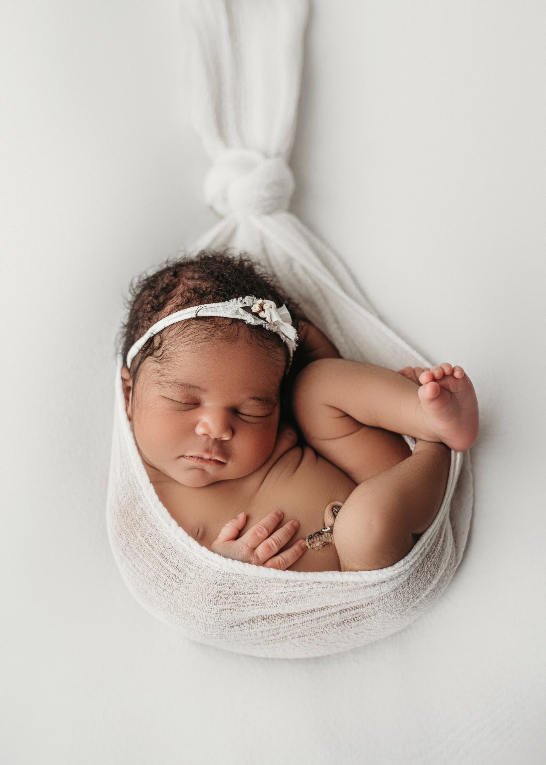DSC_3588 Newborn baby boy cuddled on blue, Omaha Nebraska photography session