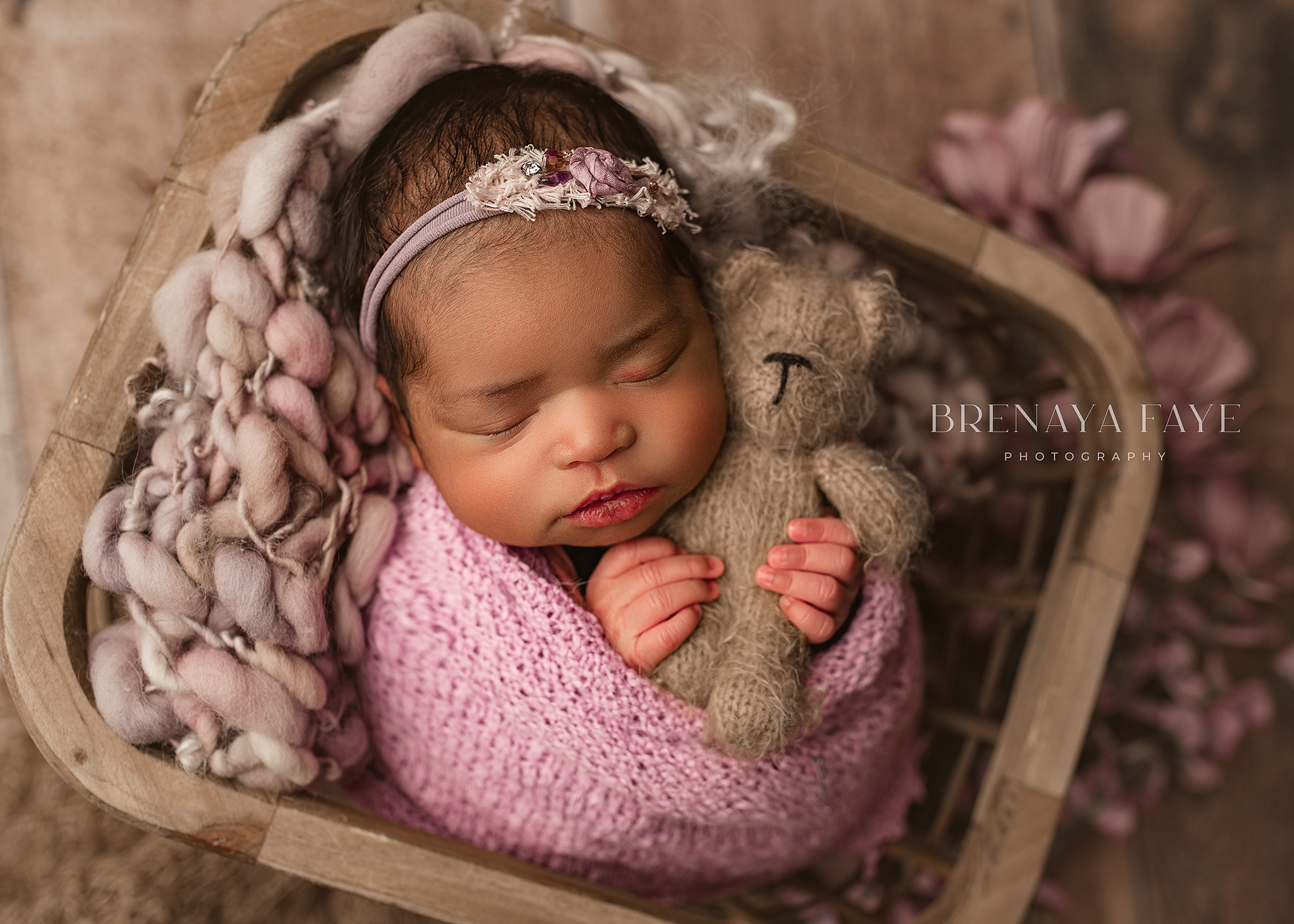 newborn photoshoot using purple, girl newborn poses, best props for newborns, newborn with bear, nebraska studio photography, prepare for a studio newborn photoshoot, newborn photography omaha ne, baby photoshoot omaha, kansas city newborn photography