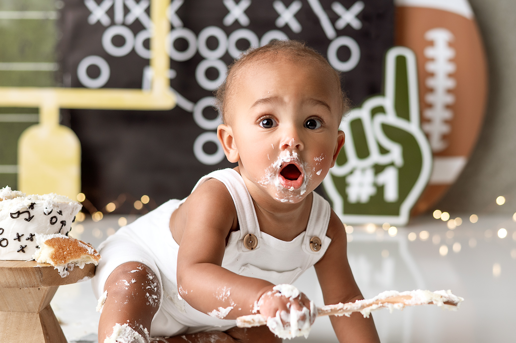 first down birthday party, first down photoshoot, best photographer in nebraska, birthday photos, smash cake, cake smash lincoln
