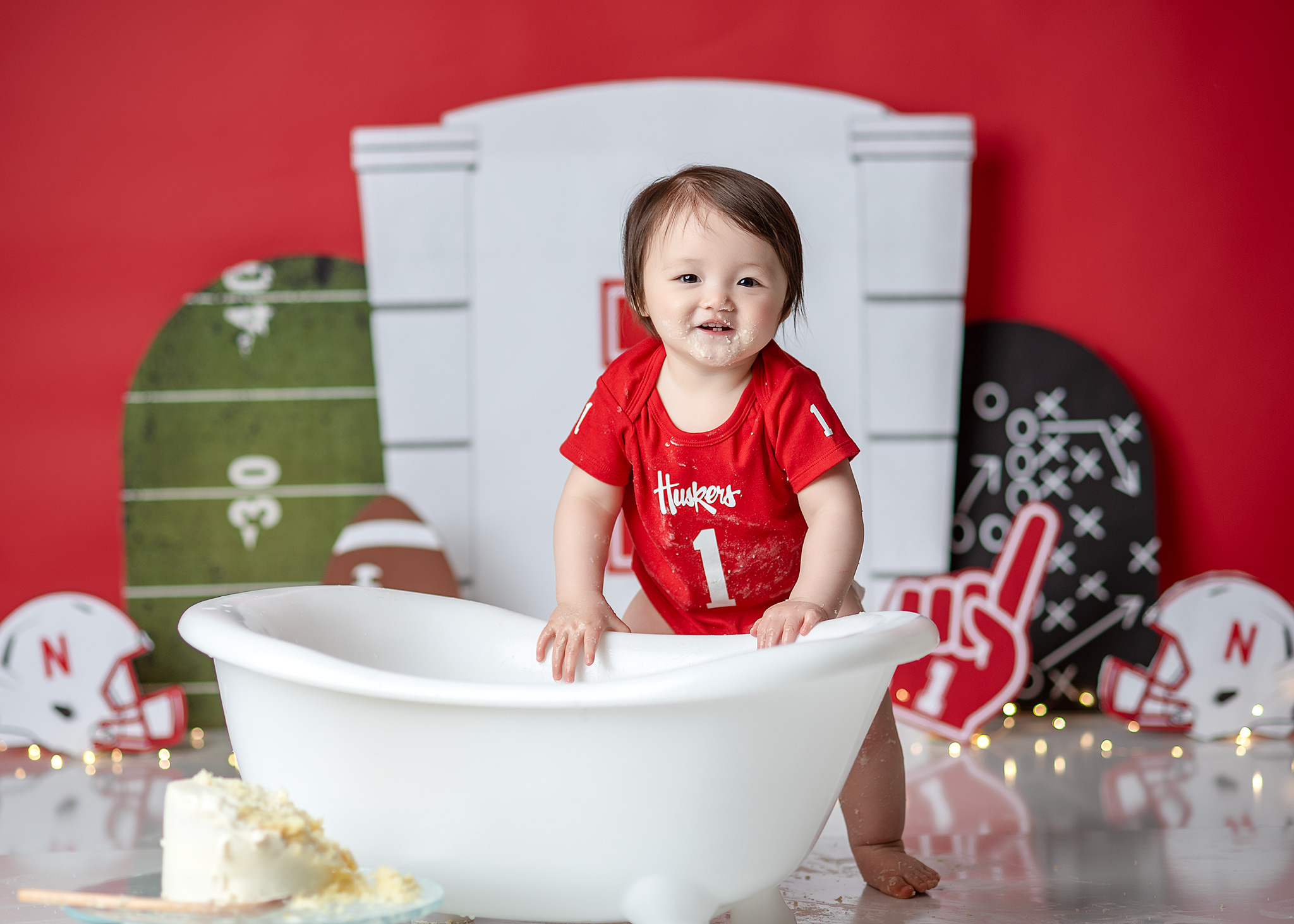 nebraska football team, birthday photoshoot lincoln, lincoln cake smash photographer, custom cake smash photographer lincoln nebraska