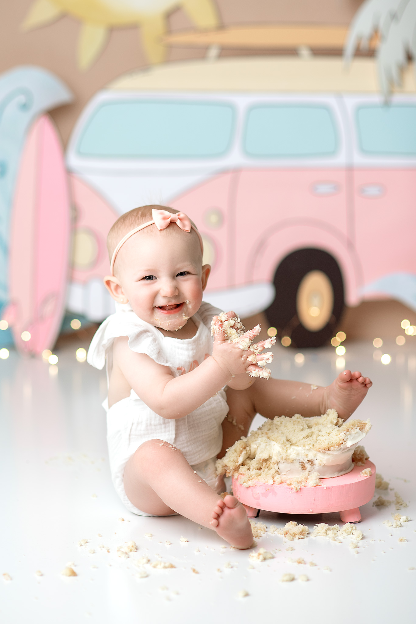 The big one cake smash, surfing cake smash ideas, girl surf smash cake, birthday photoshoot pastels